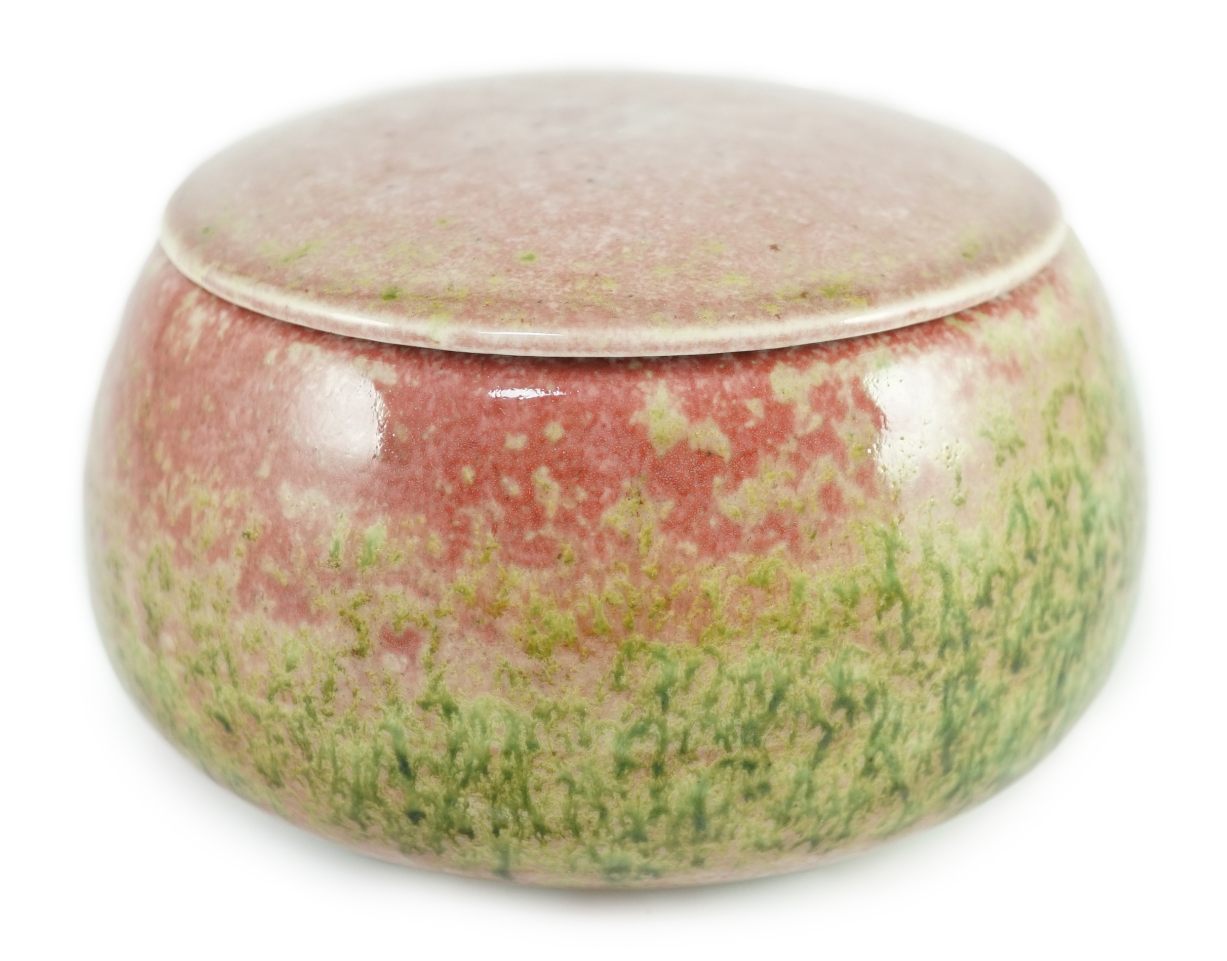 A Chinese peachbloom glazed weiqi stone box and cover, 20th century, 13.5cm diameter